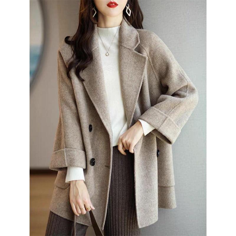 New herringbone patterned woollen coat