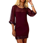 Burgundy dress with sheer sleeves on a white background