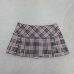 Edgy & Chic: The Pink Plaid Pleated Mini Skirt You Need!
