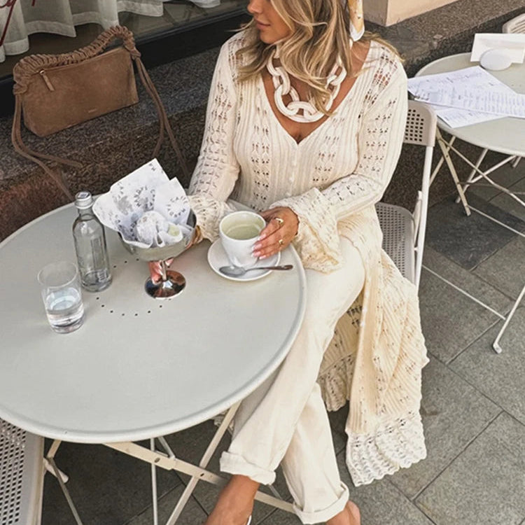 Apricot, Coffee, or Wine Red hollow out horn sleeve woolen cardigan with V-neck, long flared sleeves, high waist, and button-up front. Made of cotton, available in sizes S-L.