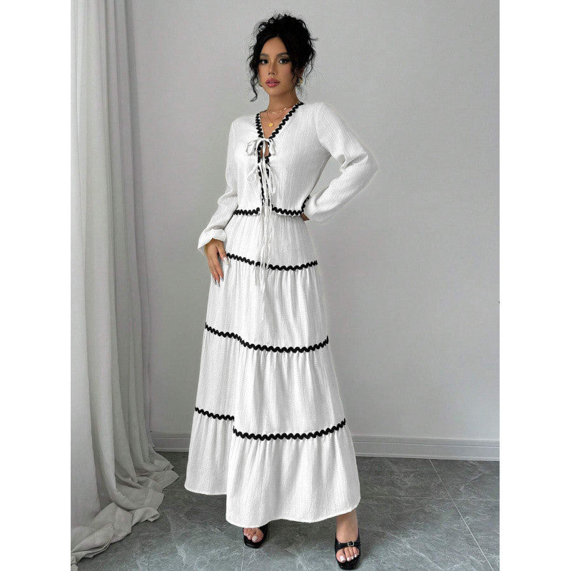 Shape a confident, elegant A-line silhouette with this stylish two-piece set.