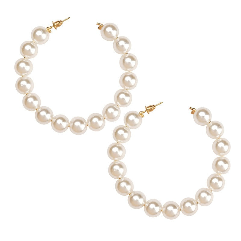 The Power Piece: Commanding Attention with Large Circle Pearl Earrings