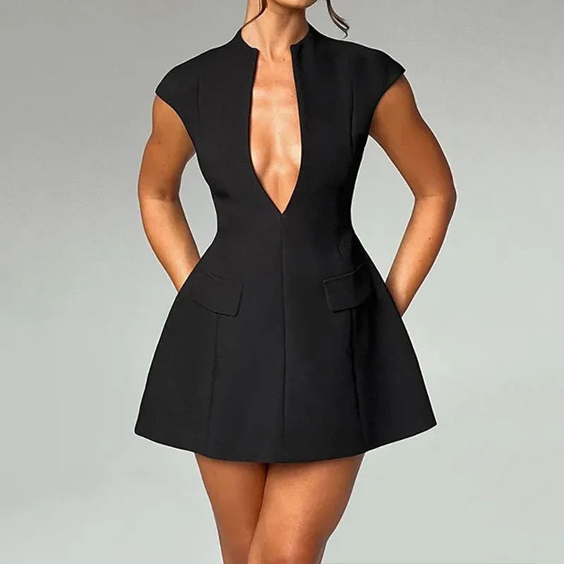 A model wearing a black elegant A-line midi dress with a V-neck and short sleeves, featuring pocket flaps.