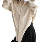 Loose silhouette casual top - runwayfashionista.com