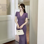 Summer Sleek: The Deep V-Strap Midi Dress