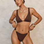 Turn heads with this daring metallic bikini designed to highlight your bold style effortlessly.
