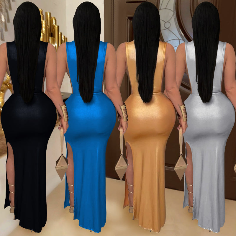 This sleek high-neck midi dress commands attention with its bold, sleeveless design—perfect for making a daring statement.