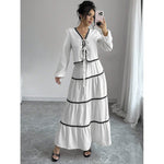 Shape a confident, elegant A-line silhouette with this stylish two-piece set.