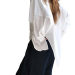 Loose silhouette casual top - runwayfashionista.com