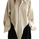 Loose silhouette casual top - runwayfashionista.com