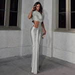 High-waisted silver long dress with irregular hollow pattern and short sleeves.