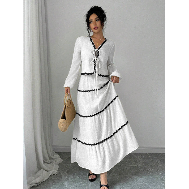 Shape a confident, elegant A-line silhouette with this stylish two-piece set.