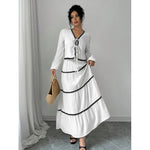 Shape a confident, elegant A-line silhouette with this stylish two-piece set.