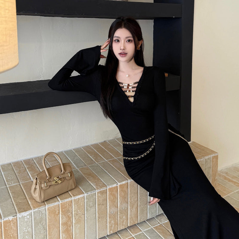 The Black V-Neck Midi: Beading, Boldness & Glamour