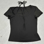 Make a bold statement in this sleek, short-sleeved square neck crop top. Perfect for a confident and stylish look, available in black and military green.