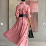 Sophisticated Silhouette: The Pink High-Waist Midi