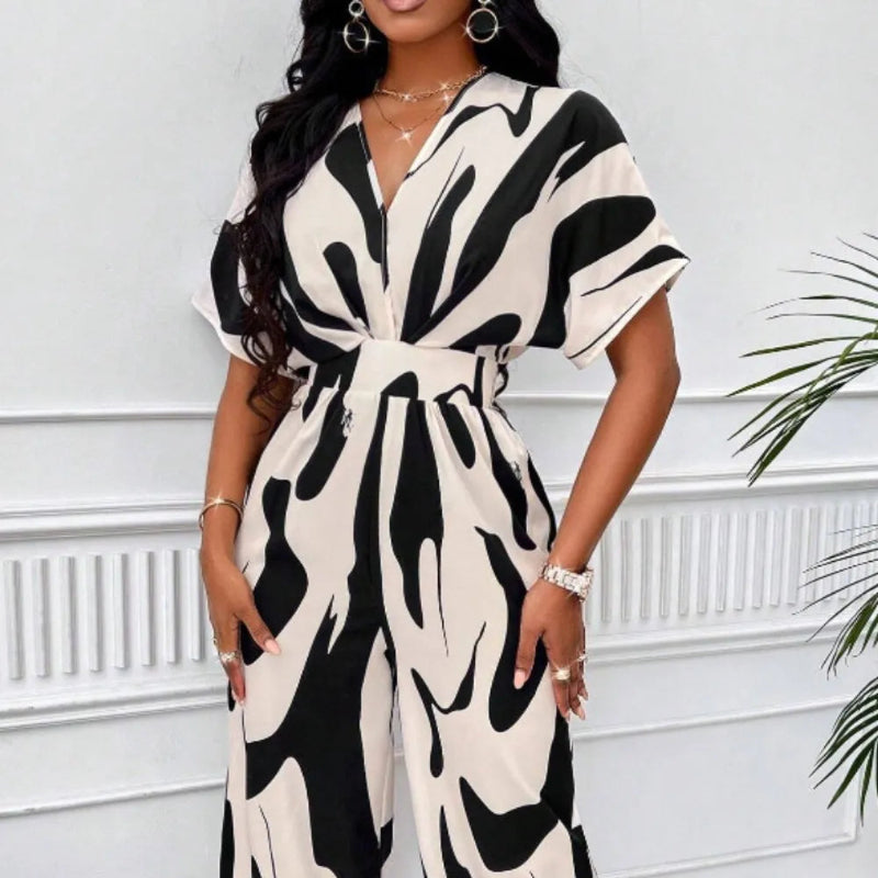 Elegant V-neck batwing sleeve wide jumpsuit - runwayfashionista.com