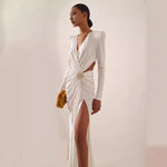 White or black long dress with metal cross-lace, halter neck, and V-neck.