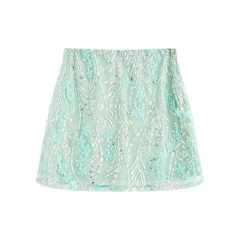 A light green ultra-short A-line skirt featuring 3D embroidery, tulle, and sequin flower details.