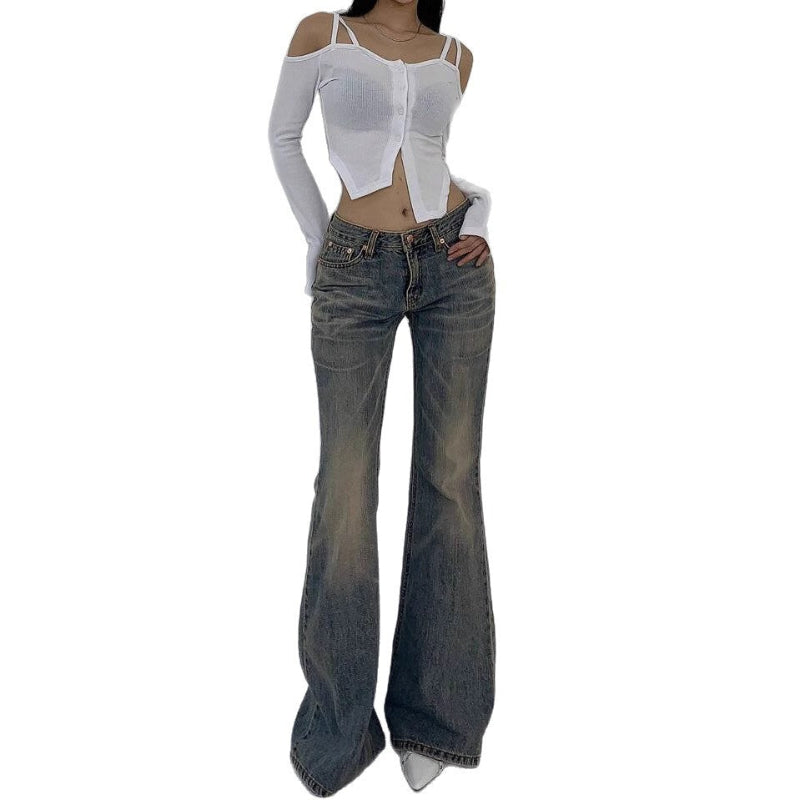 Person wearing a white top and blue flared jeans on a white background