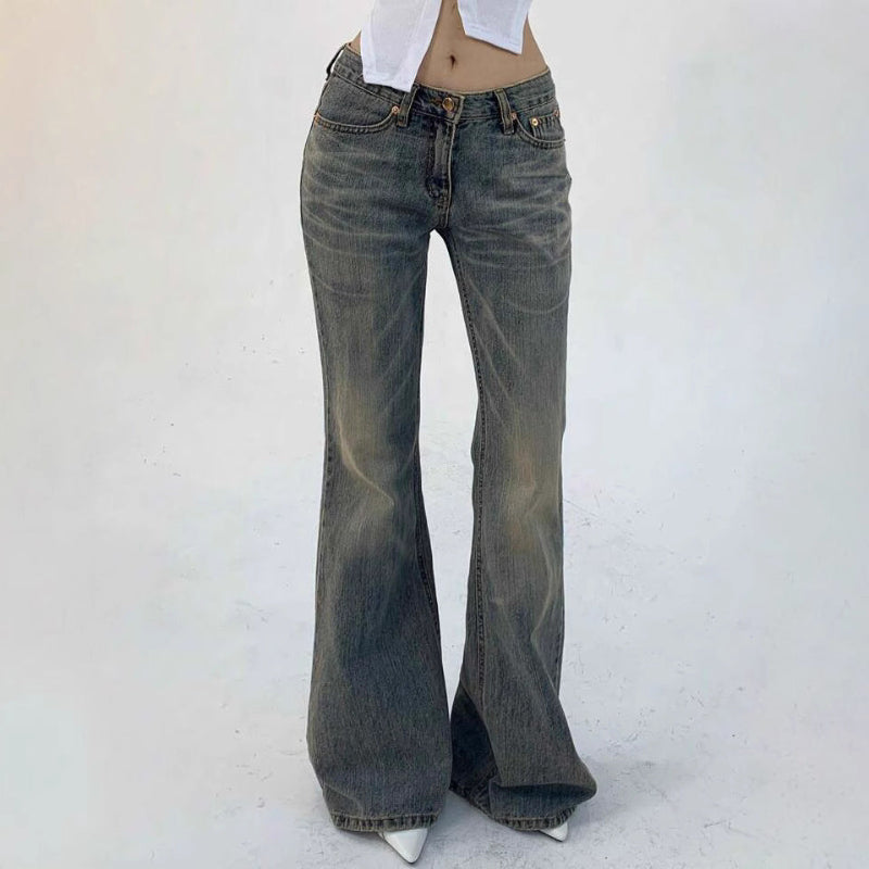 Flared jeans worn by a person on a white background