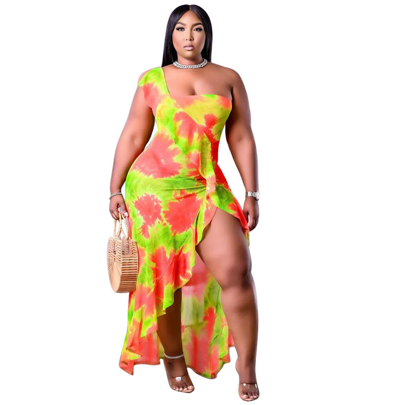 Woman wearing a colorful floral dress on a white background