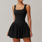 A two-piece sports dress set in a solid color, designed for comfort and flexibility during various athletic activities.