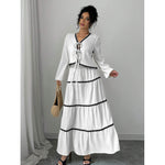 Shape a confident, elegant A-line silhouette with this stylish two-piece set.