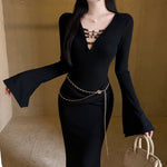 The Black V-Neck Midi: Beading, Boldness & Glamour
