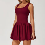 A two-piece sports dress set in a solid color, designed for comfort and flexibility during various athletic activities.