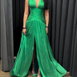 Emerald Green Plunging Neckline Gown With Pleated Skirt And Side Slit
