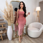 A dazzling purple backless bodycon sequined dress with a high slit and a one-shoulder neckline.