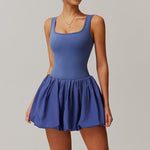 A two-piece sports dress set in a solid color, designed for comfort and flexibility during various athletic activities.