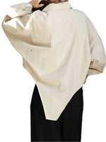 Loose silhouette casual top - runwayfashionista.com