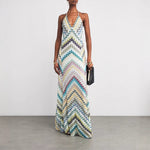 A sleeveless multicolor floral bodycon midi dress with pullover closure from Runwayfashionista.