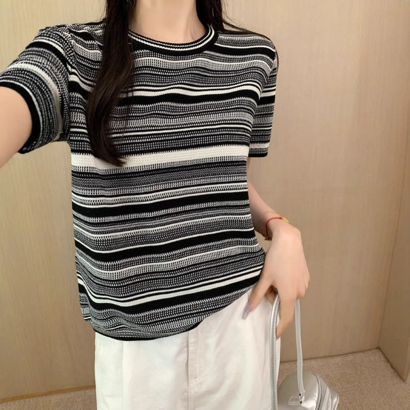 This bold round neck tee with short sleeves offers effortless style and comfort for every daring look.