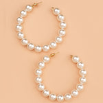 The Power Piece: Commanding Attention with Large Circle Pearl Earrings