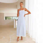 A light blue, slimming midi dress with a one-shoulder neckline and delicate lace straps, shown on a model.