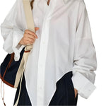 Loose silhouette casual top - runwayfashionista.com
