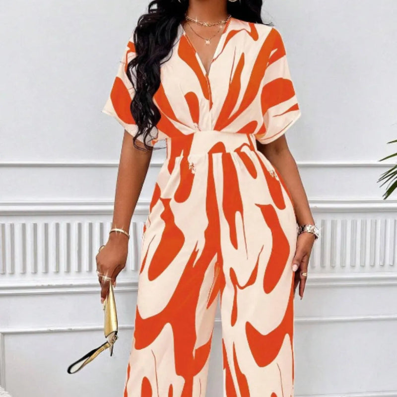 Elegant V-neck batwing sleeve wide jumpsuit - runwayfashionista.com