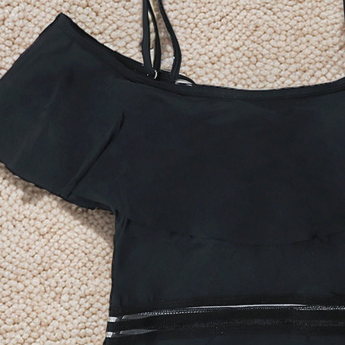 This daring one-piece swimsuit features a flattering high-waist design that enhances your silhouette with confidence and style.