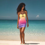 A sleeveless sequin-printed mini dress in vibrant pink, yellow, orange, green, and multicolor.
