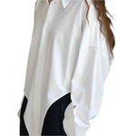 Loose silhouette casual top - runwayfashionista.com