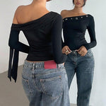 Slanted shoulder long sleeved top
