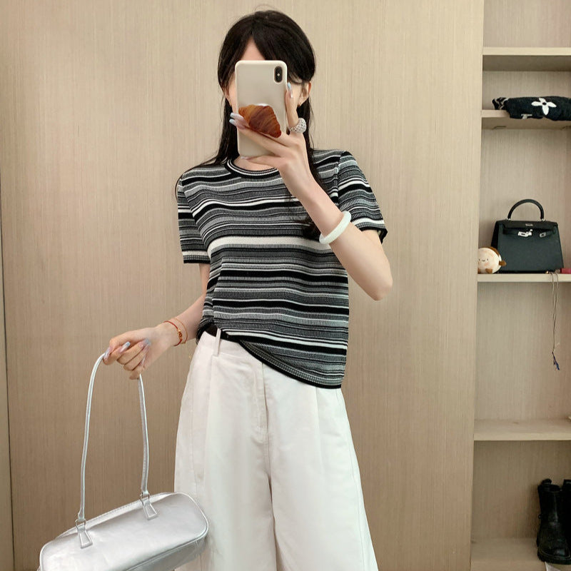 This bold round neck tee with short sleeves offers effortless style and comfort for every daring look.