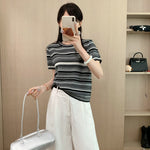 This bold round neck tee with short sleeves offers effortless style and comfort for every daring look.