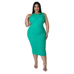 Woman wearing a green dress on a white background