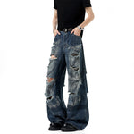Dirty Stained And Ripped Jeans