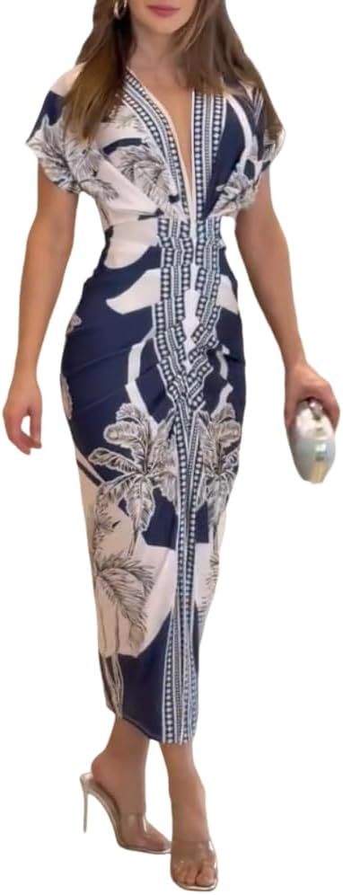 Woman wearing a blue and white patterned dress on a white background