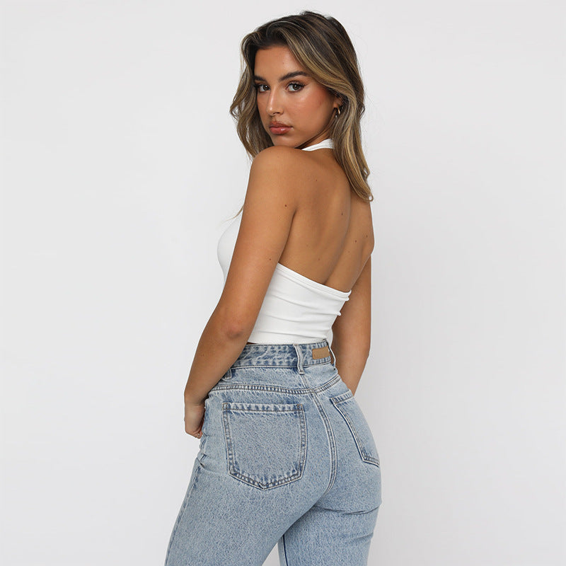 A white slim-fit sleeveless halter top displayed on a mannequin, showcasing its solid color and street fashion style.